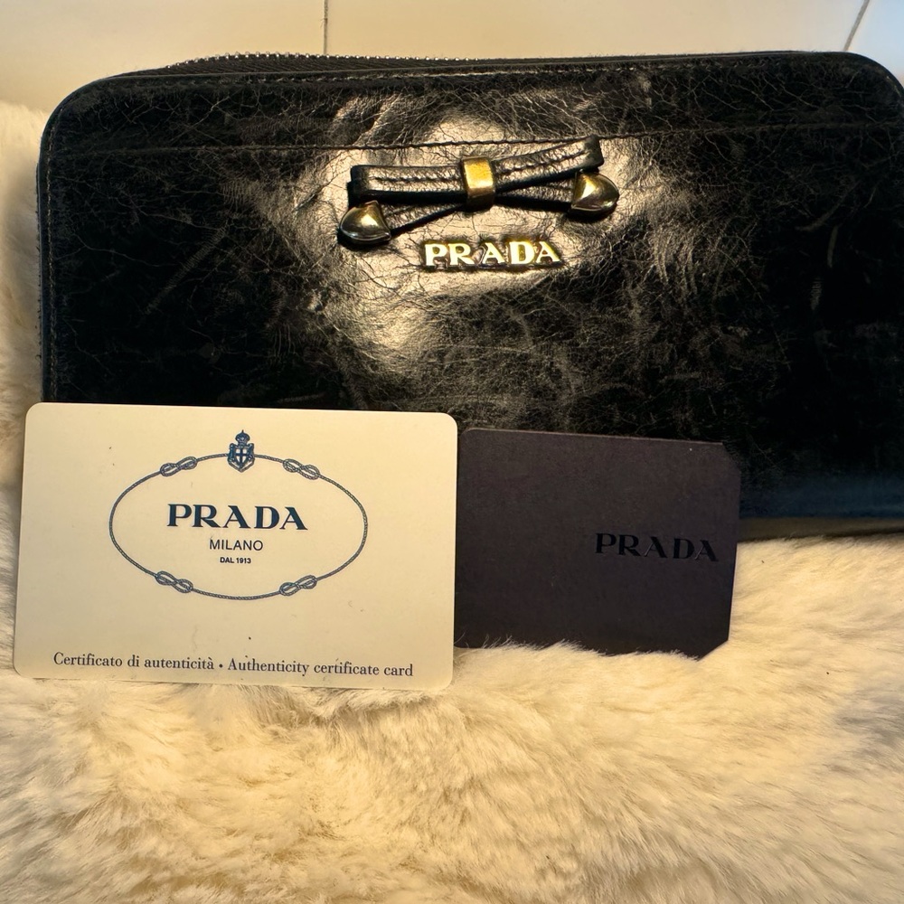 Black Leather Prada Wallet.